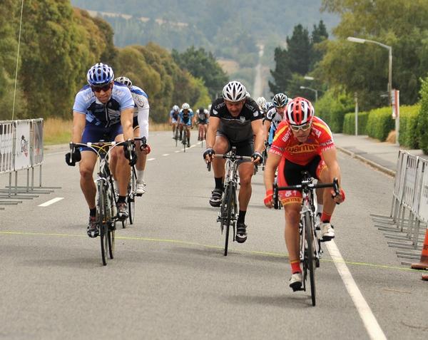 Lee Johnstone from the Warmup Cycling Team won a large frantic bunch sprint to win the 117 kilometre opening round of the Benchmark Elite masters series in North Canterbury 